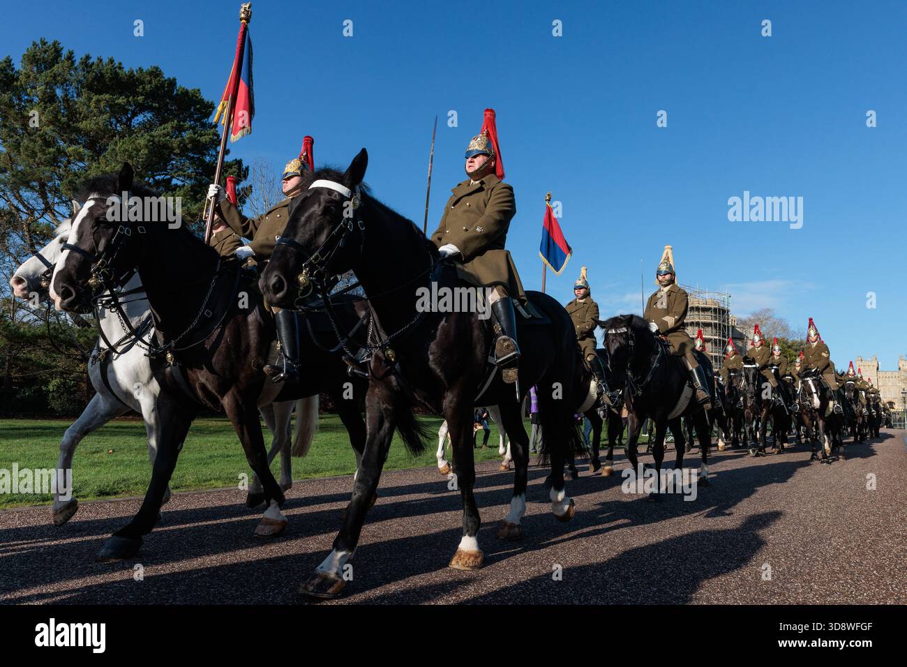 Windsor, UK. 2nd December, 2025. Mounted guards pass along the Long Walk in front of Windsor Castle during a rehearsal for a carriage ride as part of a state visit by the German President Frank-Walter Steinmeier. King Charles III will host Mr Steinmeier and his wife Elke BŸdenbender at Windsor Castle from 3rd-5th December. Credit: Mark Kerrison/Alamy Live News Stock Photo