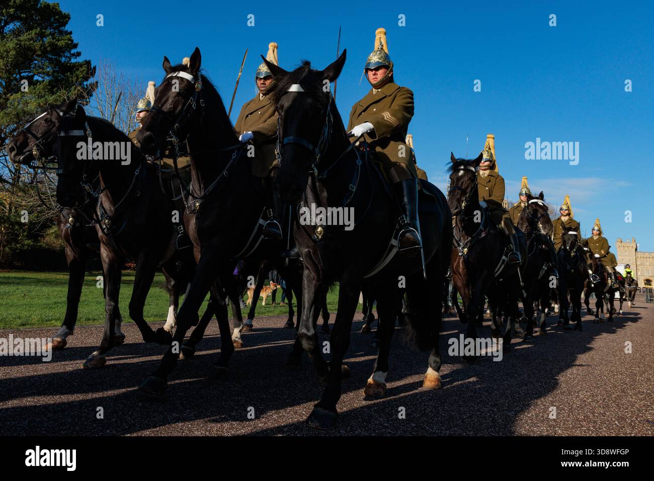 Windsor, UK. 2nd December, 2025. Mounted guards pass along the Long Walk in front of Windsor Castle during a rehearsal for a carriage ride as part of a state visit by the German President Frank-Walter Steinmeier. King Charles III will host Mr Steinmeier and his wife Elke BŸdenbender at Windsor Castle from 3rd-5th December. Credit: Mark Kerrison/Alamy Live News Stock Photo
