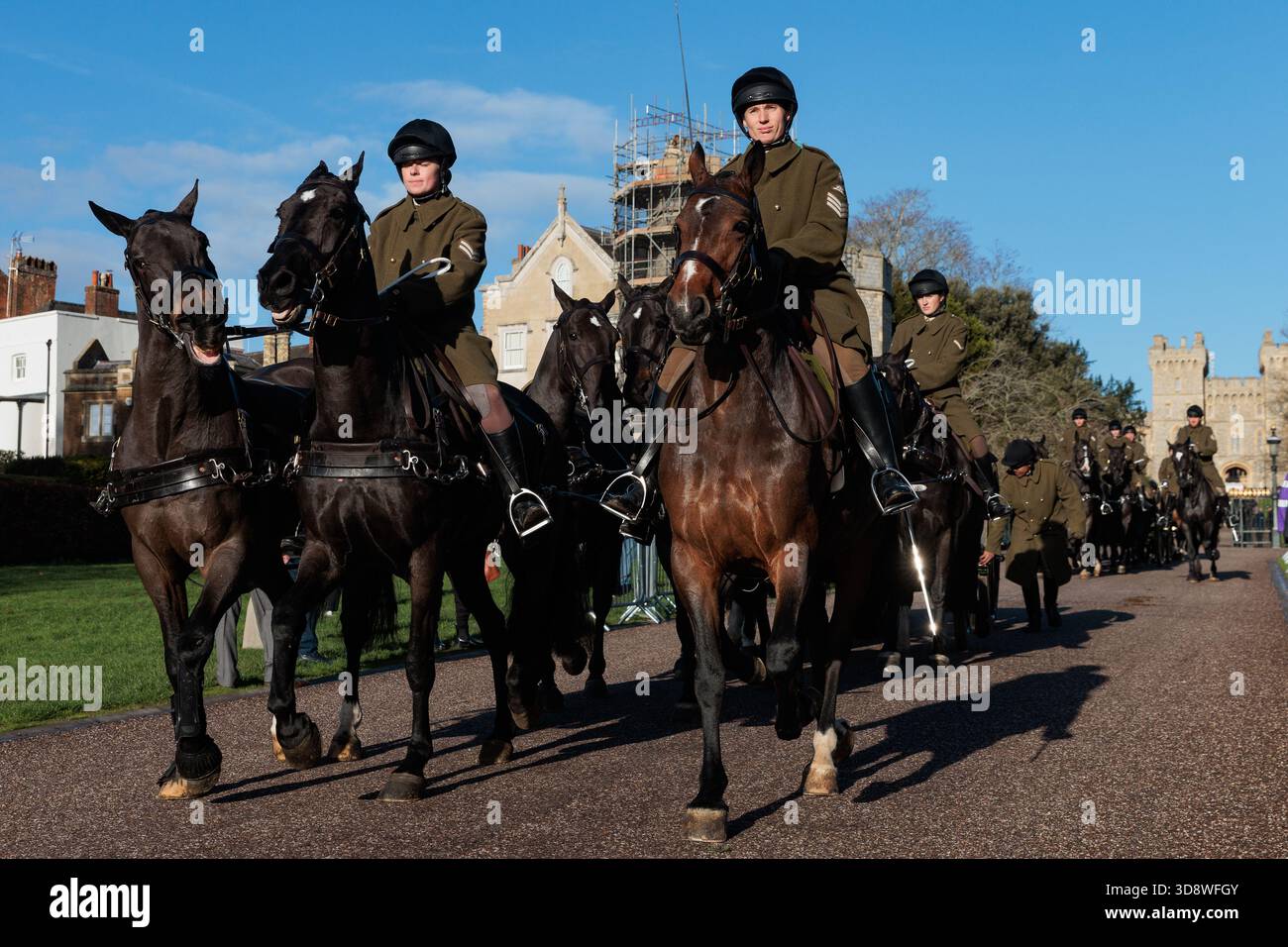 Windsor, UK. 2nd December, 2025. Military personnel pass along the Long Walk in front of Windsor Castle during a rehearsal for a carriage ride as part of a state visit by the German President Frank-Walter Steinmeier. King Charles III will host Mr Steinmeier and his wife Elke BŸdenbender at Windsor Castle from 3rd-5th December. Credit: Mark Kerrison/Alamy Live News Stock Photo