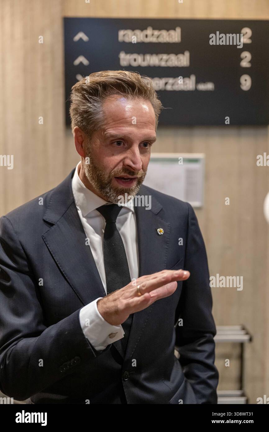 TERNEUZEN - Zeeland King's Commissioner Hugo De Jonge addresses the press before a closed meeting about the arrival of an asylum seekers' center in Terneuzen. A majority of the municipal council recently indicated its opposition to an asylum seekers' center, despite an earlier agreement for its arrival. ANP JONAS ROOSENS netherlands out - belgium out Stock Photo
