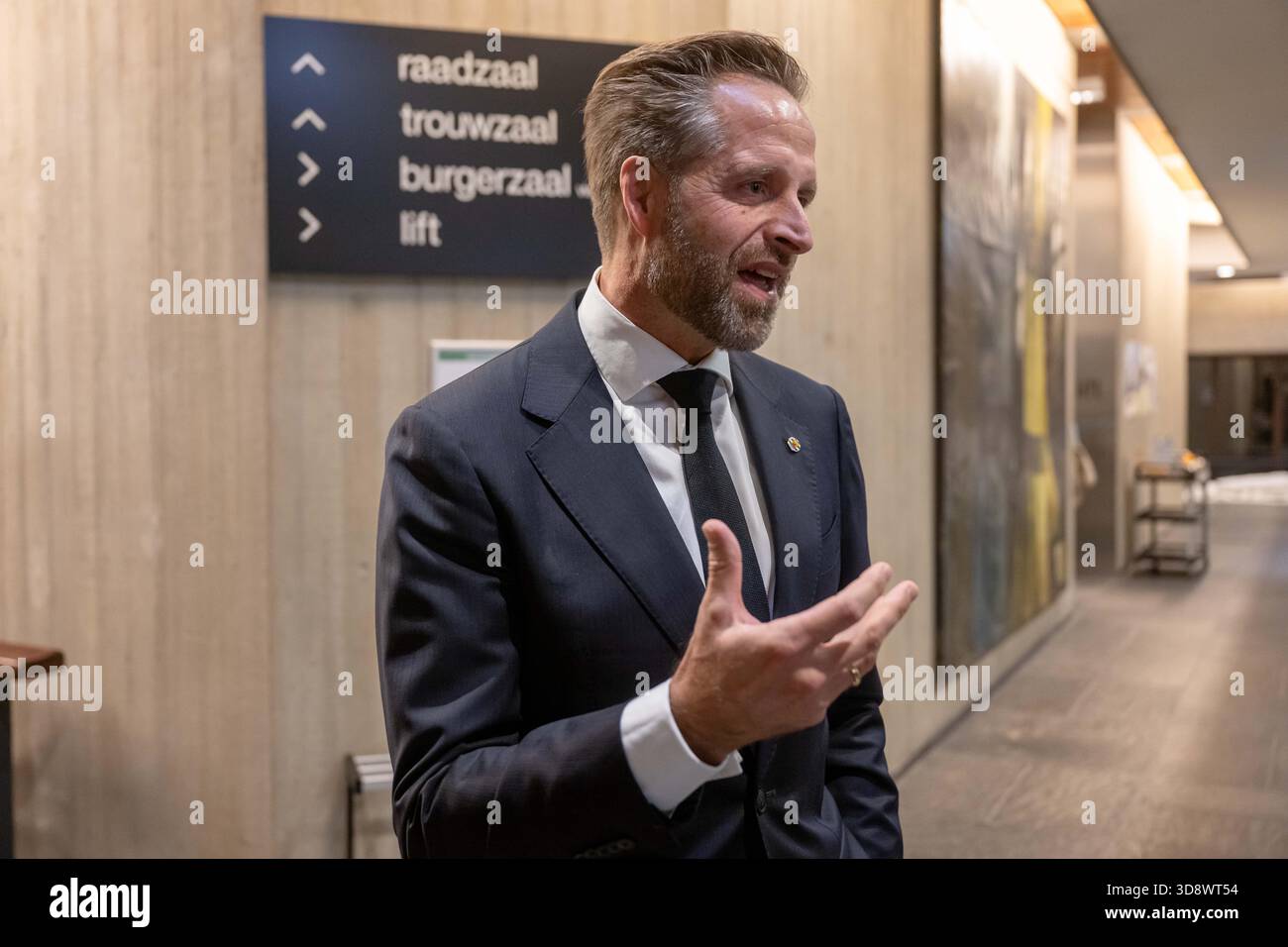 TERNEUZEN - Zeeland King's Commissioner Hugo De Jonge addresses the press before a closed meeting about the arrival of an asylum seekers' center in Terneuzen. A majority of the municipal council recently indicated its opposition to an asylum seekers' center, despite an earlier agreement for its arrival. ANP JONAS ROOSENS netherlands out - belgium out Stock Photo