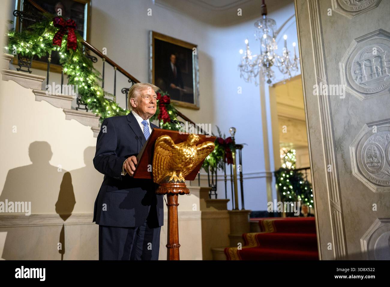President Donald Trump delivers remarks to staff during a Christmas ...