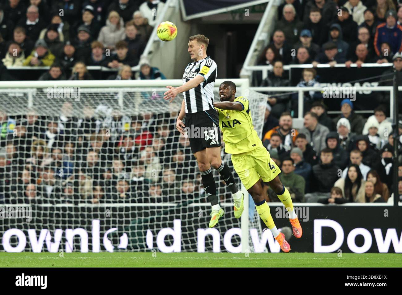Newcastle, UK. 02nd Dec, 2025. Dan Burn of Newcastle United jumps up to win the high ball during the Premier League match Newcastle United vs Tottenham Hotspur at St. James's Park, Newcastle, United Kingdom, 2nd December 2025 (Photo by Alfie Cosgrove/News Images) *** GER AUT SUI OUT *** in Newcastle, United Kingdom on 12/2/2025. (Photo by Alfie Cosgrove/News Images/Sipa USA) Credit: Sipa USA/Alamy Live News Stock Photo