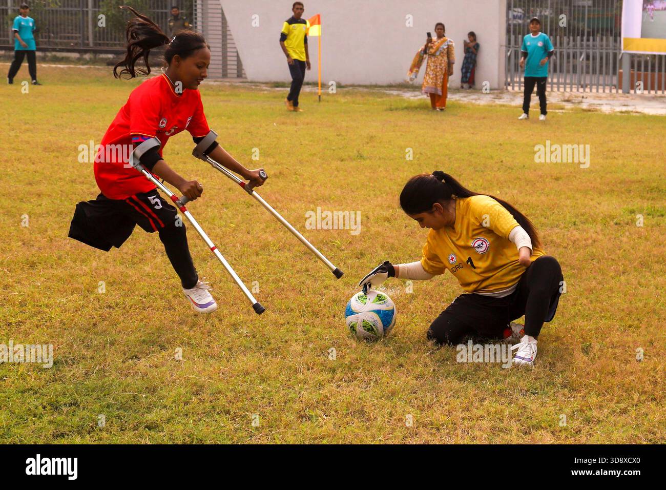 Dhaka, Dhaka, BANGLADESH. 2nd Dec, 2025. Players with physical disabilities take part in an amputee football match in Dhaka, Bangladesh, on 02 December 2025. The country's first-ever Amputee Football League, launched with support from Sports for Hope & Independence and the International Committee of the Red Cross, began as part of activities marking the International Day of Persons with Disabilities. (Credit Image: © Abu Sufian Jewel/ZUMA Press Wire) EDITORIAL USAGE ONLY! Not for Commercial USAGE! Stock Photo