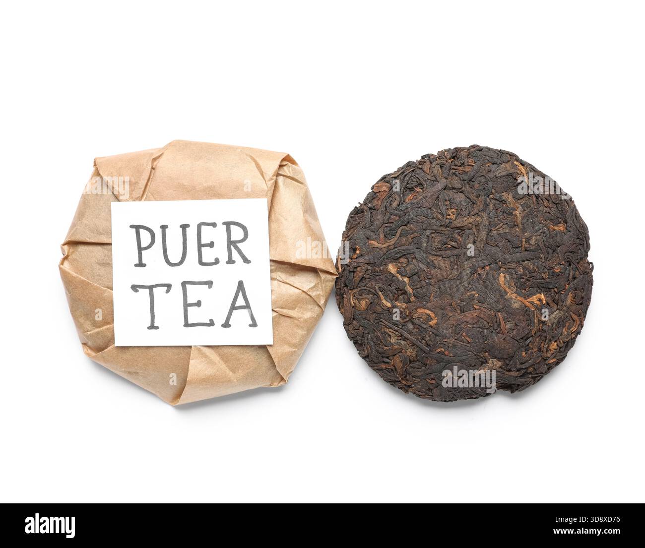 Dry pressed puer tea with sticky note on white background Stock Photo