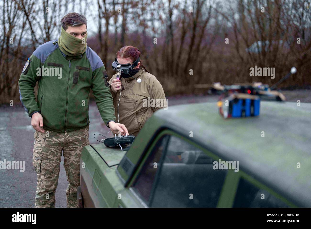 Vovchansk Direction, Kharkiv Region, Ukraine. 2nd Dec, 2025. 22-year-old Ukrainian drone pilot Dasha and 29-year-old Ukrainian drone operator Vlad prepare for a demonstration FPV-drone flight at an unspecified location in the Vovchansk Direction.Image taken in late November 2025. (Credit Image: © Andreas Stroh/ZUMA Press Wire) EDITORIAL USAGE ONLY! Not for Commercial USAGE! Stock Photo