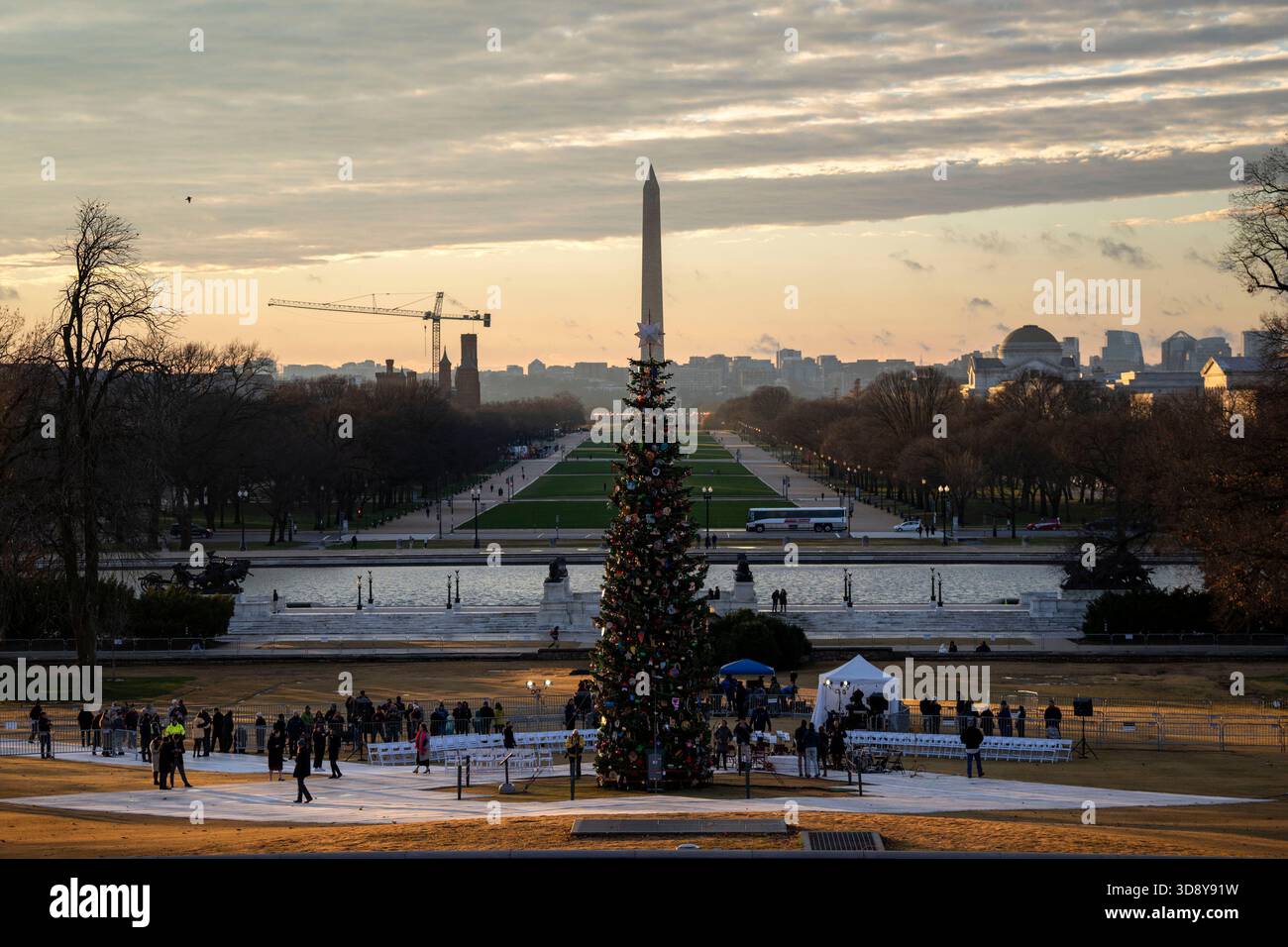 Washington, United States. 02nd Dec, 2025. The 2025 Capitol Christmas tree is seen against the Washington Monument before a ceremony with Speaker of the House Mike Johnson, R-LA, members of the Nevada Congressional delegation and the Secretary of Agriculture to light the tree on the West Front Lawn of the U.S. Capitol in Washington, DC on Tuesday, December 2, 2025. The tree, a 53-foot red fir from the Humboldt-Toiyabe National Forest in Nevada, is nicknamed 'Silver Belle' and is the first Capitol Christmas Tree to be selected from Nevada. Photo by Bonnie Cash/UPI Credit: UPI/Alamy Live News Stock Photo