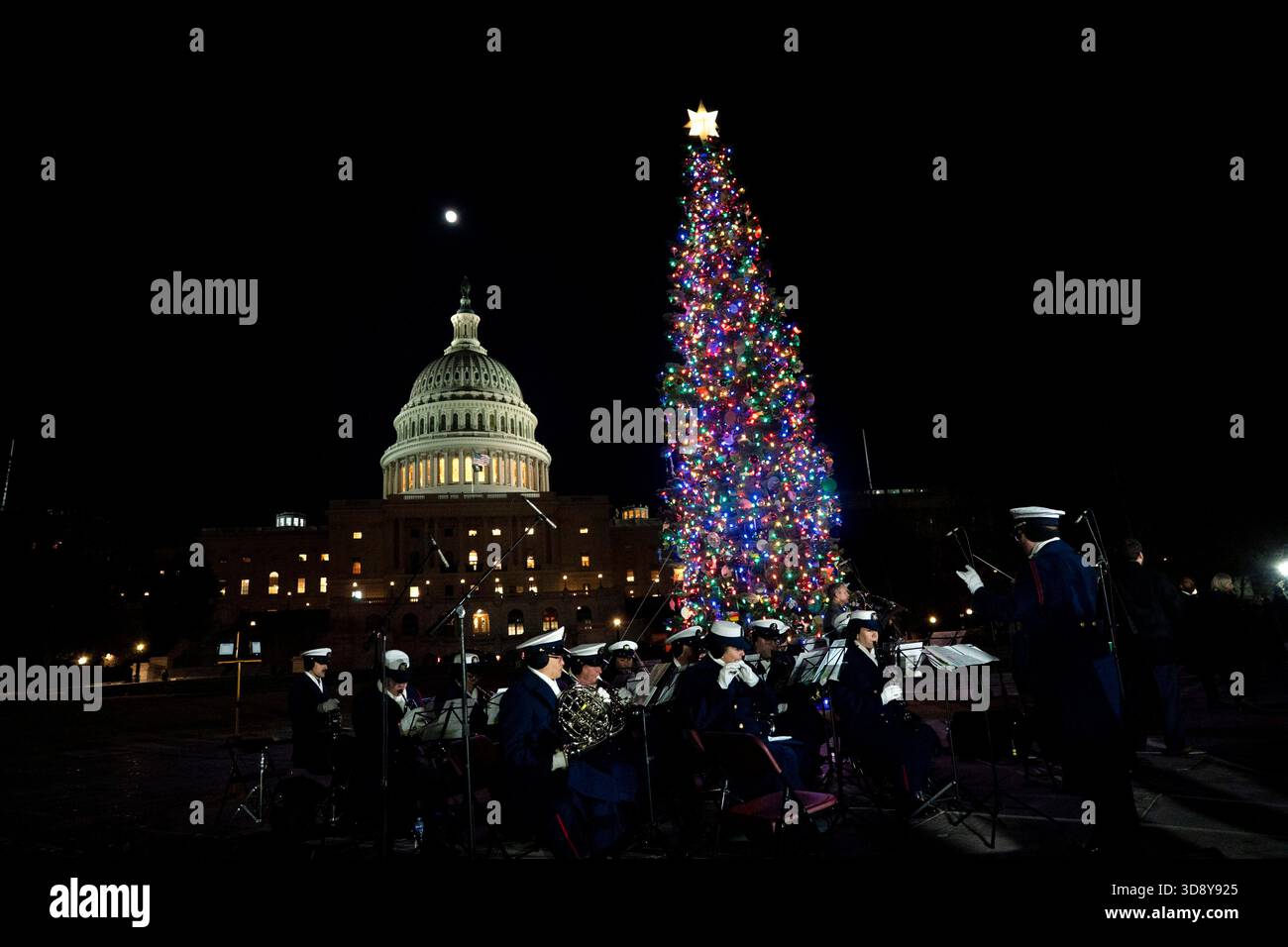 Washington, United States. 02nd Dec, 2025. The U.S. Coast Guard Band plays during a ceremony with Speaker of the House Mike Johnson, R-LA, members of the Nevada Congressional delegation and the Secretary of Agriculture to light the U.S. Capitol Christmas Tree on the West Front Lawn of the U.S. Capitol in Washington, DC on Tuesday, December 2, 2025. The tree, a 53-foot red fir from the Humboldt-Toiyabe National Forest in Nevada, is nicknamed 'Silver Belle.' Photo by Bonnie Cash/UPI Credit: UPI/Alamy Live News Stock Photo