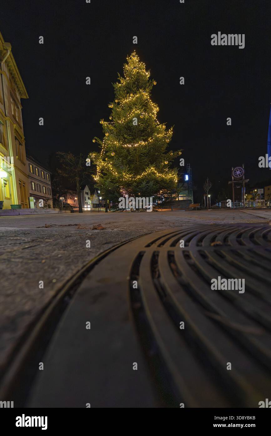 A Christmas tree shot from below with lights at night, Aidlingen, Boeblingen district, Germany Stock Photo