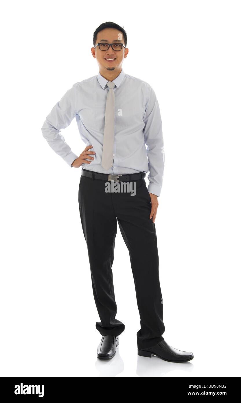 Full body attractive young Asian businessman standing isolated on white ...