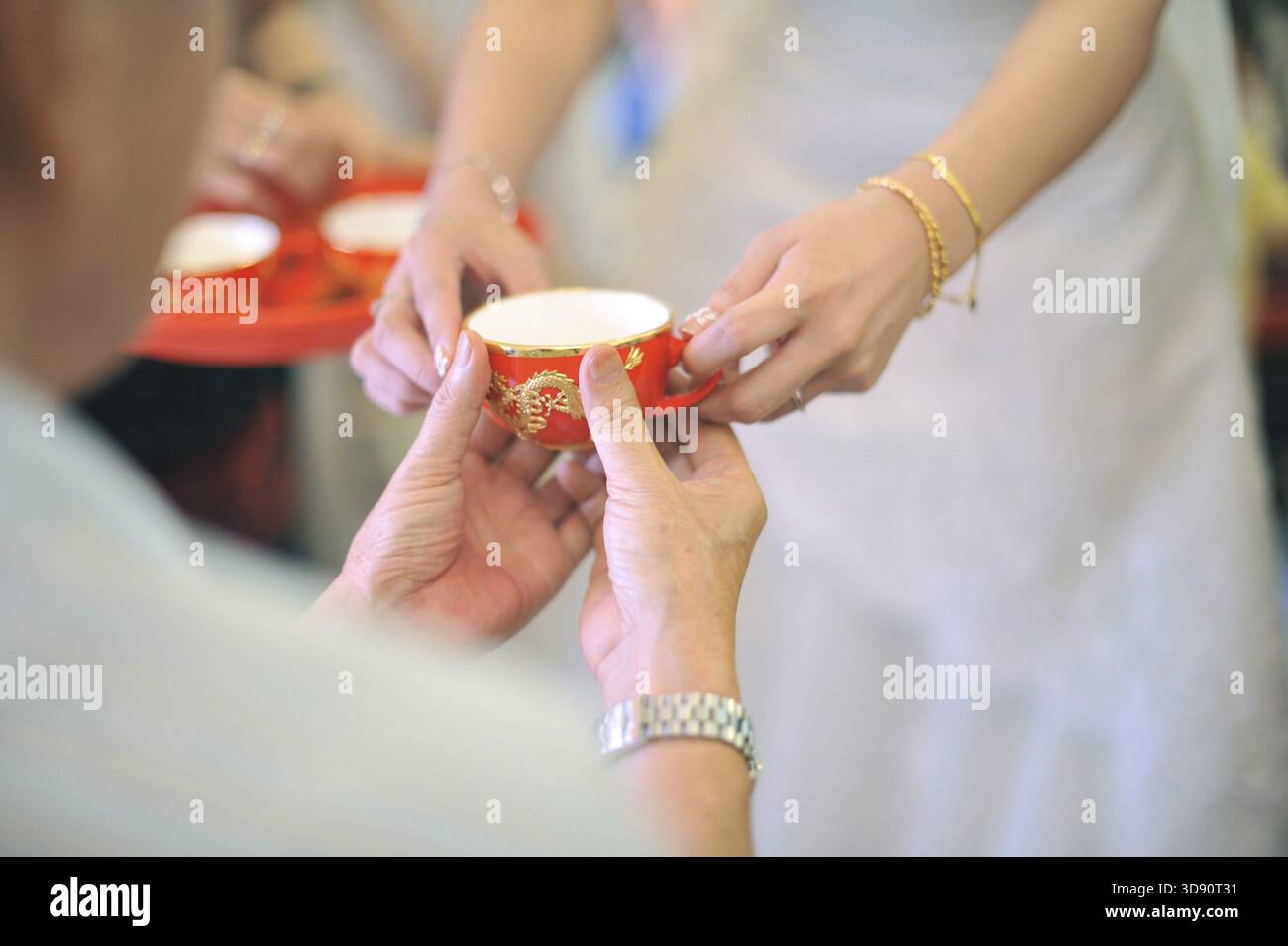 Chinese wedding tea ceremony serving to elders Stock Photo
