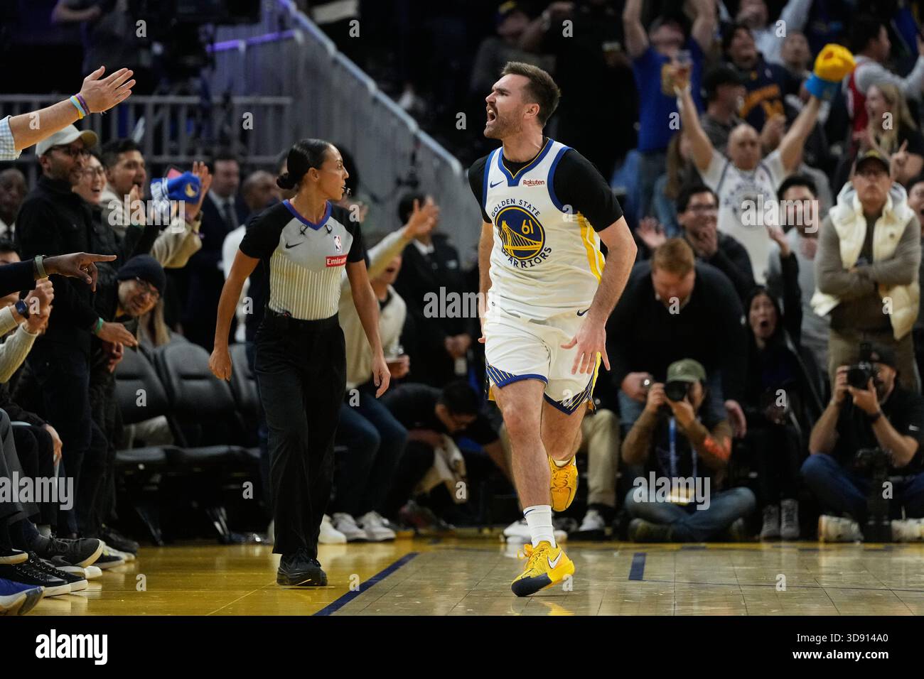 Golden State Warriors guard Pat Spencer (61) celebrates after scoring