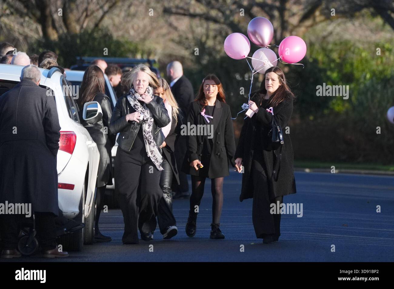 Mourners arriving the funeral of Chloe Hipson at Daldowie Crematorium in Glasgow. 21-year-old Chloe was one of five people killed when their Volkswagen Golf was in a collision with a Toyota Land Cruiser on a road near Dundalk on November 15. Picture date: Tuesday December 2, 2025. Stock Photo