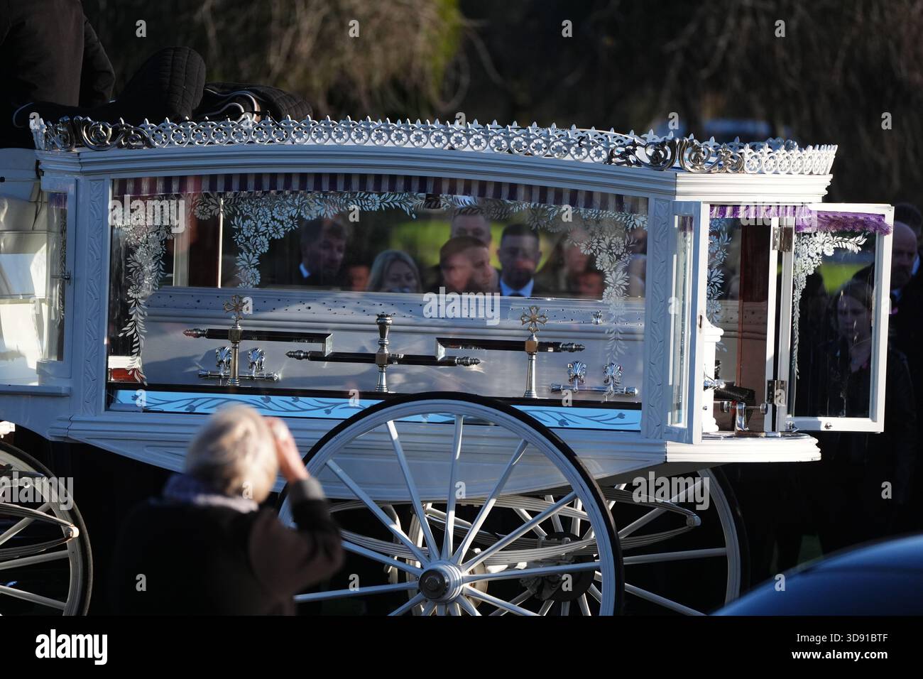 The coffin arrives by horse drawn hearse for the funeral of Chloe Hipson at Daldowie Crematorium in Glasgow. 21-year-old Chloe was one of five people killed when their Volkswagen Golf was in a collision with a Toyota Land Cruiser on a road near Dundalk on November 15. Picture date: Tuesday December 2, 2025. Stock Photo