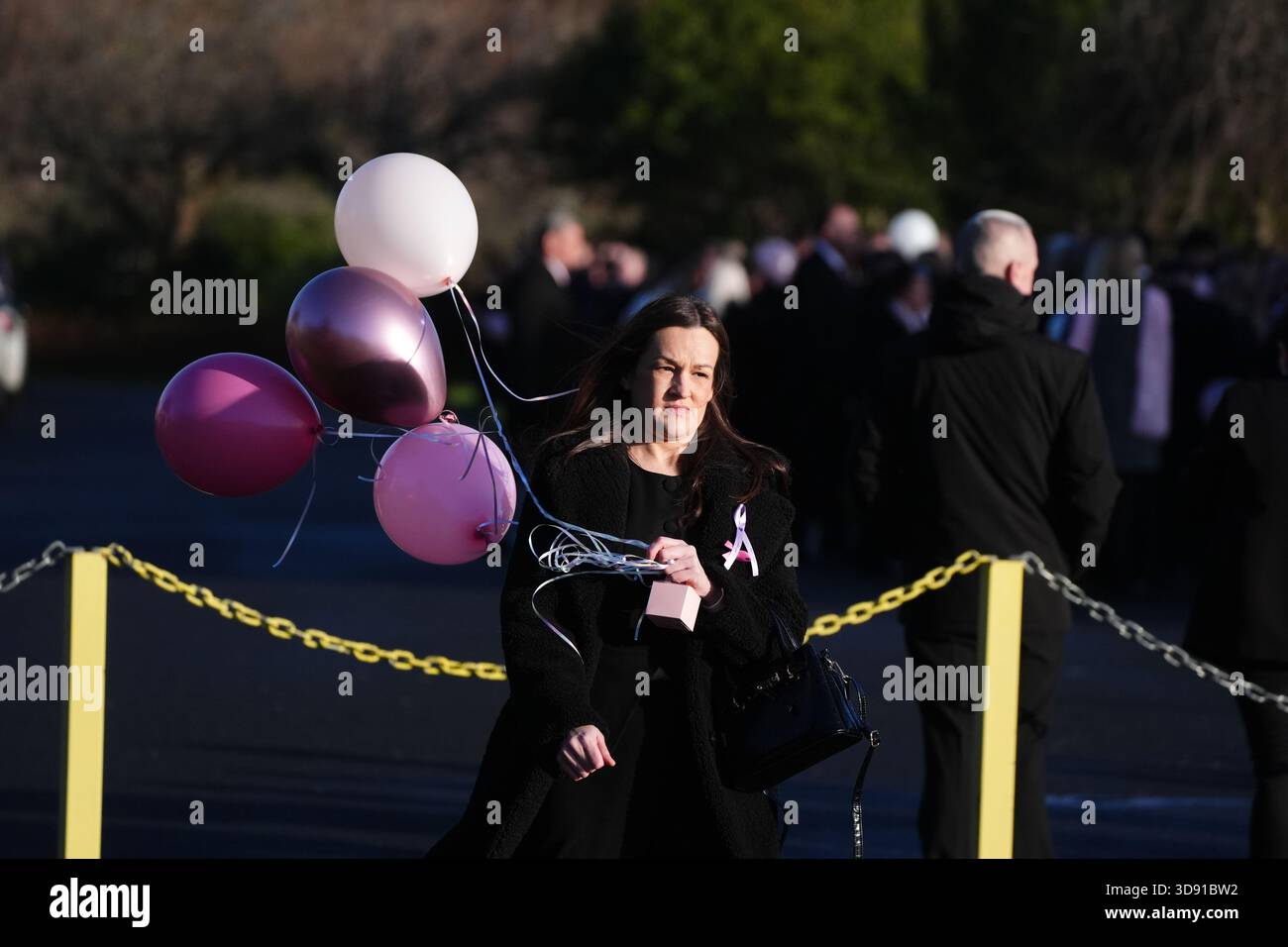 Mourners arriving the funeral of Chloe Hipson at Daldowie Crematorium in Glasgow. 21-year-old Chloe was one of five people killed when their Volkswagen Golf was in a collision with a Toyota Land Cruiser on a road near Dundalk on November 15. Picture date: Tuesday December 2, 2025. Stock Photo
