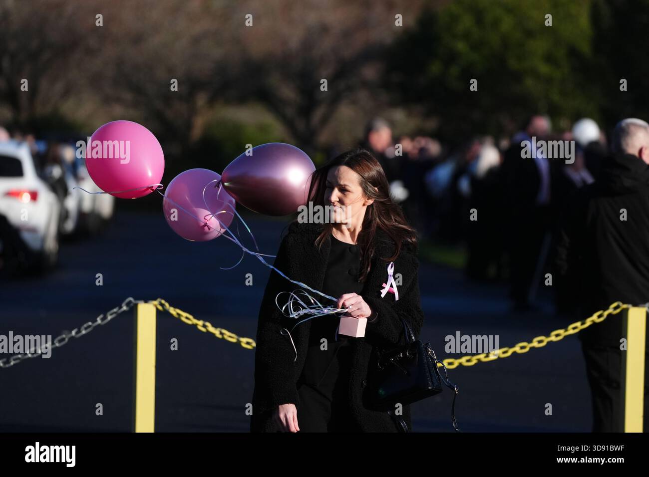 Mourners arriving the funeral of Chloe Hipson at Daldowie Crematorium in Glasgow. 21-year-old Chloe was one of five people killed when their Volkswagen Golf was in a collision with a Toyota Land Cruiser on a road near Dundalk on November 15. Picture date: Tuesday December 2, 2025. Stock Photo