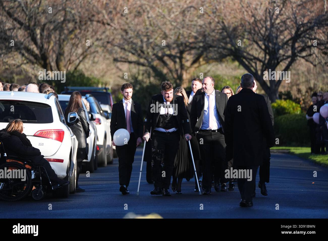 Mourners arriving the funeral of Chloe Hipson at Daldowie Crematorium in Glasgow. 21-year-old Chloe was one of five people killed when their Volkswagen Golf was in a collision with a Toyota Land Cruiser on a road near Dundalk on November 15. Picture date: Tuesday December 2, 2025. Stock Photo