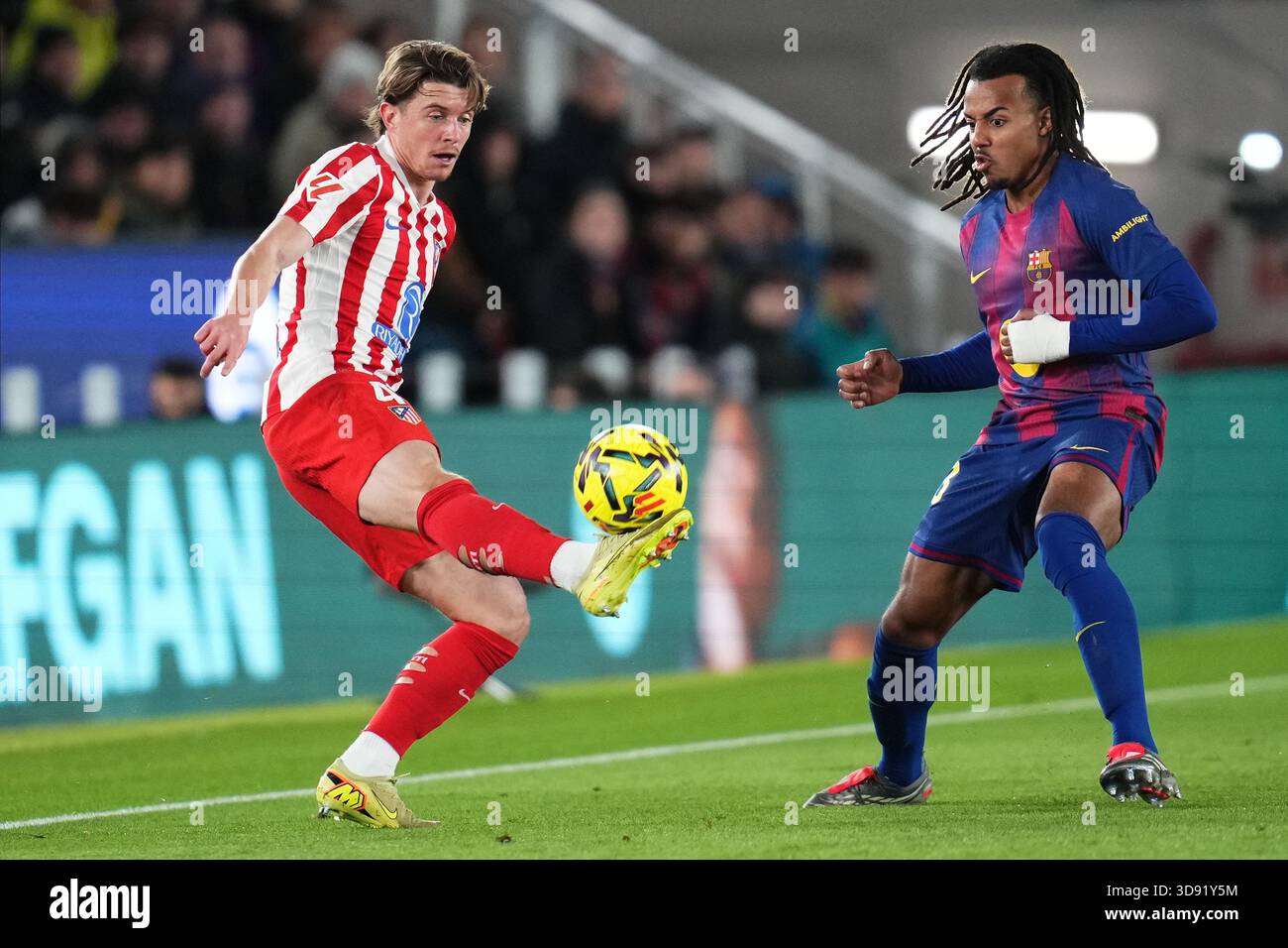 Barcelona, Spain. 03rd Dec, 2025. Connor Gallagher of Atletico de Madrid and Jules Kounde of FC Barcelona during the La Liga EA Sports match between FC Barcelona and Atletico de Madrid played at Spotify Camp Nou Stadium on December 2 2025 in Barcelona, Spain. (Photo by Bagu Blanco/PRESSIN) Credit: PRESSINPHOTO SPORTS AGENCY/Alamy Live News Stock Photo