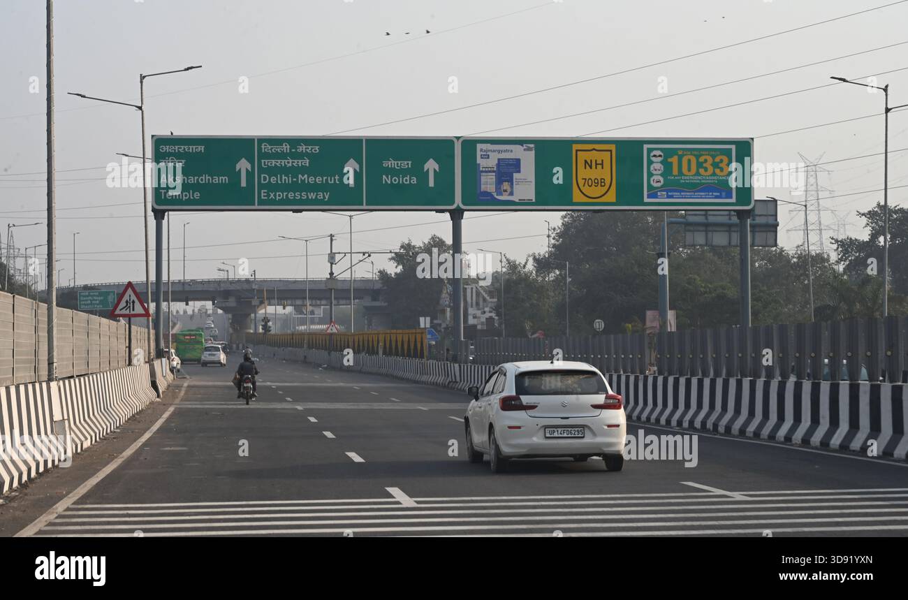 NEW DELHI, INDIA - DECEMBER 1: Traffic seen on Saharanpur Dehradun Expressway as it is open for Public Trial from last night, on December 1, 2025 in New Delhi, India. Once completed, the 210 km high-speed corridor is expected to reduce the travel time between Delhi and Dehradun from the current 6 to 6.5 hours to just 2 to 2.5 hours, significantly improving connectivity between the national capital, western Uttar Pradesh, and Uttarakhand. Authorities are preparing to inaugurate a 32 km-long completed section of the expressway between late December and early January, even as work continues at an Stock Photo