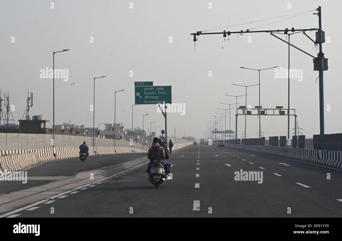 NEW DELHI, INDIA - DECEMBER 1: Traffic seen on Saharanpur Dehradun Expressway as it is open for Public Trial from last night, on December 1, 2025 in New Delhi, India. Once completed, the 210 km high-speed corridor is expected to reduce the travel time between Delhi and Dehradun from the current 6 to 6.5 hours to just 2 to 2.5 hours, significantly improving connectivity between the national capital, western Uttar Pradesh, and Uttarakhand. Authorities are preparing to inaugurate a 32 km-long completed section of the expressway between late December and early January, even as work continues at an Stock Photo