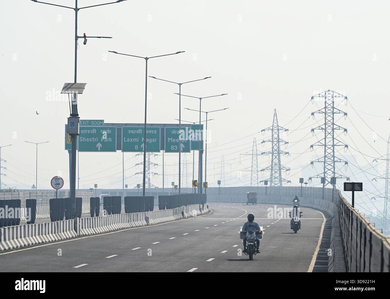 NEW DELHI, INDIA - DECEMBER 1: Traffic seen on Saharanpur Dehradun Expressway as it is open for Public Trial from last night, on December 1, 2025 in New Delhi, India. Once completed, the 210 km high-speed corridor is expected to reduce the travel time between Delhi and Dehradun from the current 6 to 6.5 hours to just 2 to 2.5 hours, significantly improving connectivity between the national capital, western Uttar Pradesh, and Uttarakhand. Authorities are preparing to inaugurate a 32 km-long completed section of the expressway between late December and early January, even as work continues at an Stock Photo