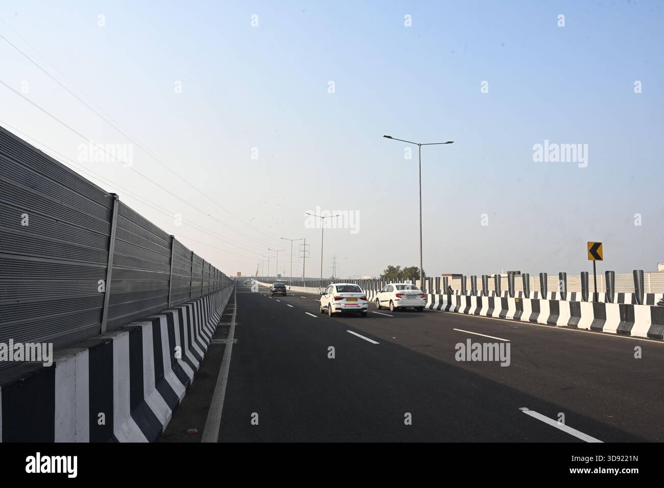 NEW DELHI, INDIA - DECEMBER 1: Traffic seen on Saharanpur Dehradun Expressway as it is open for Public Trial from last night, on December 1, 2025 in New Delhi, India. Once completed, the 210 km high-speed corridor is expected to reduce the travel time between Delhi and Dehradun from the current 6 to 6.5 hours to just 2 to 2.5 hours, significantly improving connectivity between the national capital, western Uttar Pradesh, and Uttarakhand. Authorities are preparing to inaugurate a 32 km-long completed section of the expressway between late December and early January, even as work continues at an Stock Photo