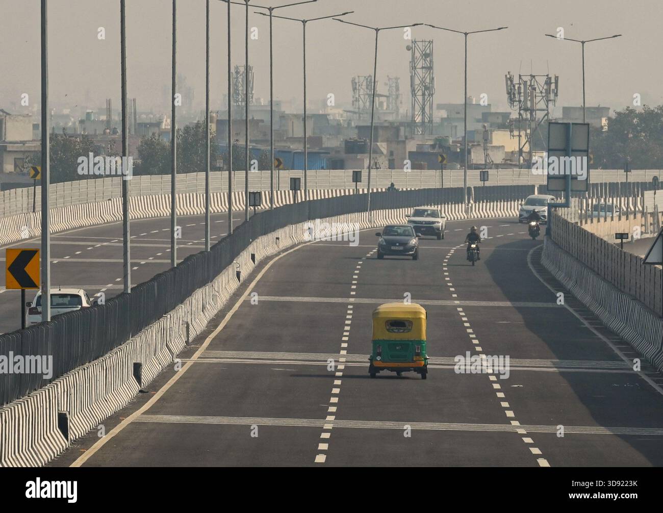 NEW DELHI, INDIA - DECEMBER 1: Traffic seen on Saharanpur Dehradun Expressway as it is open for Public Trial from last night, on December 1, 2025 in New Delhi, India. Once completed, the 210 km high-speed corridor is expected to reduce the travel time between Delhi and Dehradun from the current 6 to 6.5 hours to just 2 to 2.5 hours, significantly improving connectivity between the national capital, western Uttar Pradesh, and Uttarakhand. Authorities are preparing to inaugurate a 32 km-long completed section of the expressway between late December and early January, even as work continues at an Stock Photo