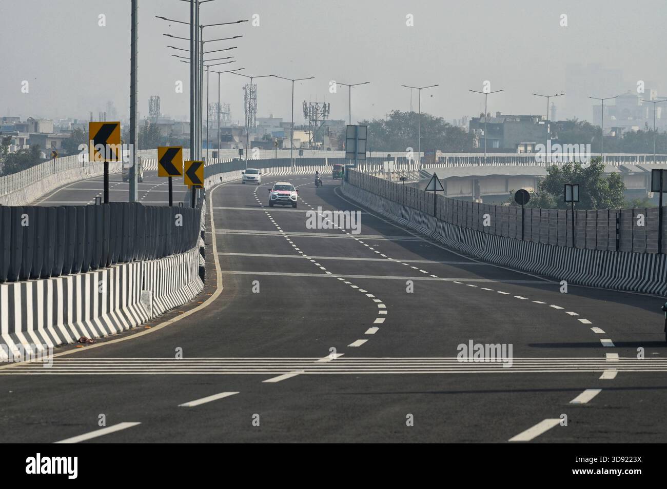 NEW DELHI, INDIA - DECEMBER 1: Traffic seen on Saharanpur Dehradun Expressway as it is open for Public Trial from last night, on December 1, 2025 in New Delhi, India. Once completed, the 210 km high-speed corridor is expected to reduce the travel time between Delhi and Dehradun from the current 6 to 6.5 hours to just 2 to 2.5 hours, significantly improving connectivity between the national capital, western Uttar Pradesh, and Uttarakhand. Authorities are preparing to inaugurate a 32 km-long completed section of the expressway between late December and early January, even as work continues at an Stock Photo