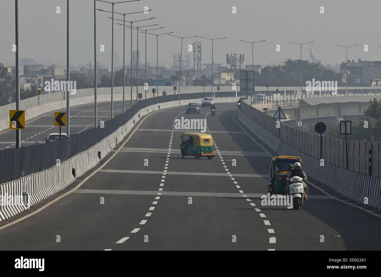 NEW DELHI, INDIA - DECEMBER 1: Traffic seen on Saharanpur Dehradun Expressway as it is open for Public Trial from last night, on December 1, 2025 in New Delhi, India. Once completed, the 210 km high-speed corridor is expected to reduce the travel time between Delhi and Dehradun from the current 6 to 6.5 hours to just 2 to 2.5 hours, significantly improving connectivity between the national capital, western Uttar Pradesh, and Uttarakhand. Authorities are preparing to inaugurate a 32 km-long completed section of the expressway between late December and early January, even as work continues at an Stock Photo
