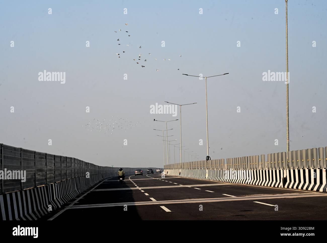 NEW DELHI, INDIA - DECEMBER 1: Traffic seen on Saharanpur Dehradun Expressway as it is open for Public Trial from last night, on December 1, 2025 in New Delhi, India. Once completed, the 210 km high-speed corridor is expected to reduce the travel time between Delhi and Dehradun from the current 6 to 6.5 hours to just 2 to 2.5 hours, significantly improving connectivity between the national capital, western Uttar Pradesh, and Uttarakhand. Authorities are preparing to inaugurate a 32 km-long completed section of the expressway between late December and early January, even as work continues at an Stock Photo