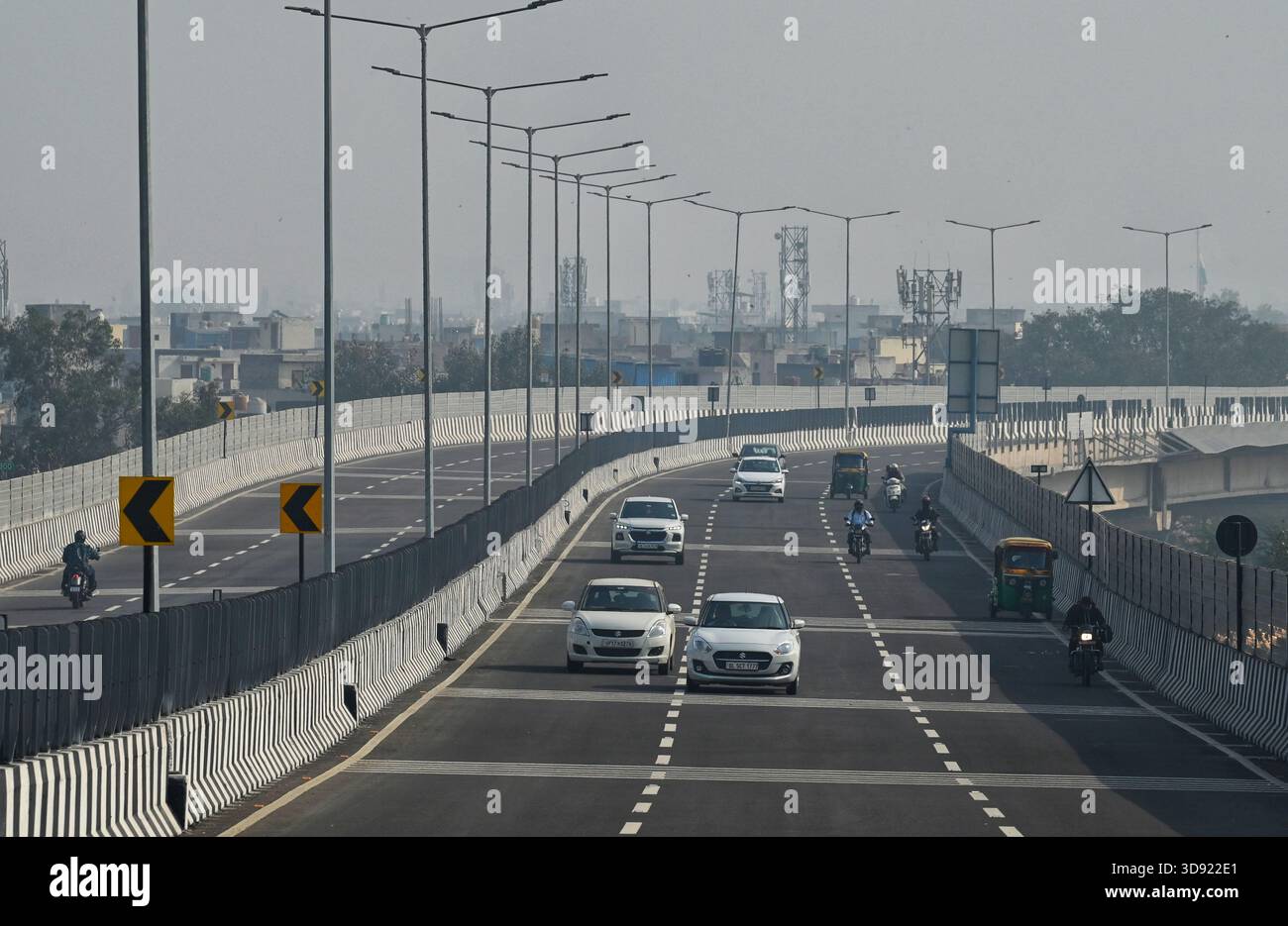 NEW DELHI, INDIA - DECEMBER 1: Traffic seen on Saharanpur Dehradun Expressway as it is open for Public Trial from last night, on December 1, 2025 in New Delhi, India. Once completed, the 210 km high-speed corridor is expected to reduce the travel time between Delhi and Dehradun from the current 6 to 6.5 hours to just 2 to 2.5 hours, significantly improving connectivity between the national capital, western Uttar Pradesh, and Uttarakhand. Authorities are preparing to inaugurate a 32 km-long completed section of the expressway between late December and early January, even as work continues at an Stock Photo