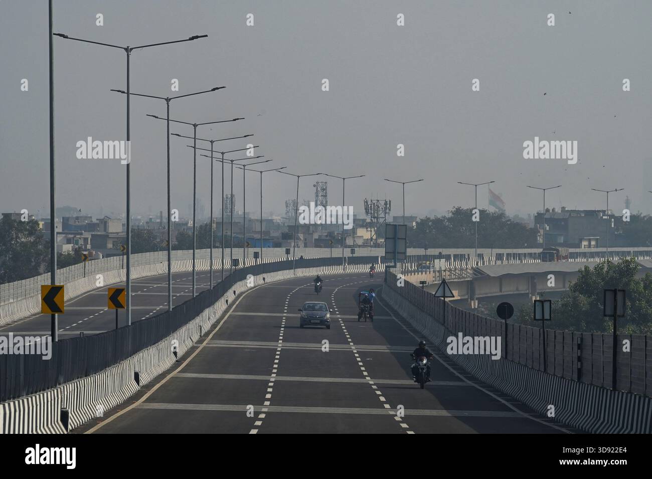 NEW DELHI, INDIA - DECEMBER 1: Traffic seen on Saharanpur Dehradun Expressway as it is open for Public Trial from last night, on December 1, 2025 in New Delhi, India. Once completed, the 210 km high-speed corridor is expected to reduce the travel time between Delhi and Dehradun from the current 6 to 6.5 hours to just 2 to 2.5 hours, significantly improving connectivity between the national capital, western Uttar Pradesh, and Uttarakhand. Authorities are preparing to inaugurate a 32 km-long completed section of the expressway between late December and early January, even as work continues at an Stock Photo
