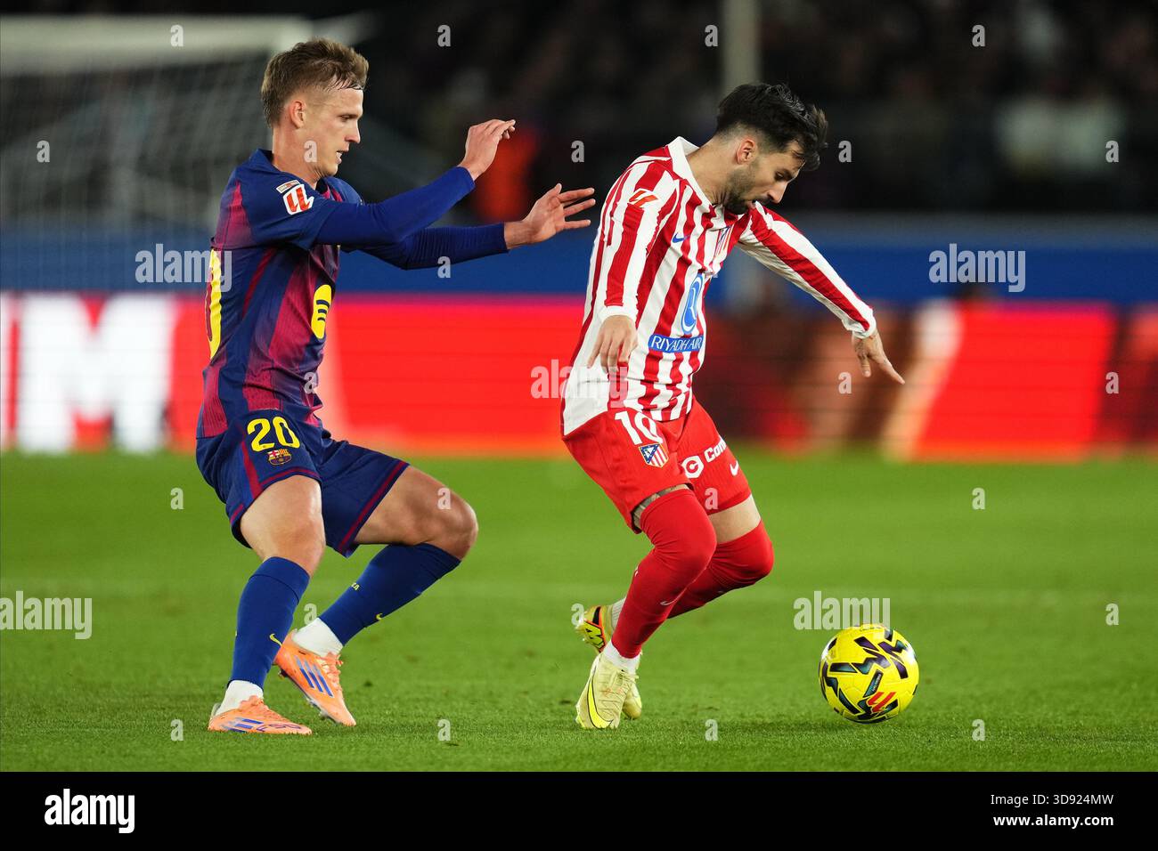 Barcelona, Spain. 03rd Dec, 2025. Alex Baena of Atletico de Madrid and Dani Olmo of FC Barcelona during the La Liga EA Sports match between FC Barcelona and Atletico de Madrid played at Spotify Camp Nou Stadium on December 2 2025 in Barcelona, Spain. (Photo by Bagu Blanco/PRESSIN) Credit: PRESSINPHOTO SPORTS AGENCY/Alamy Live News Stock Photo