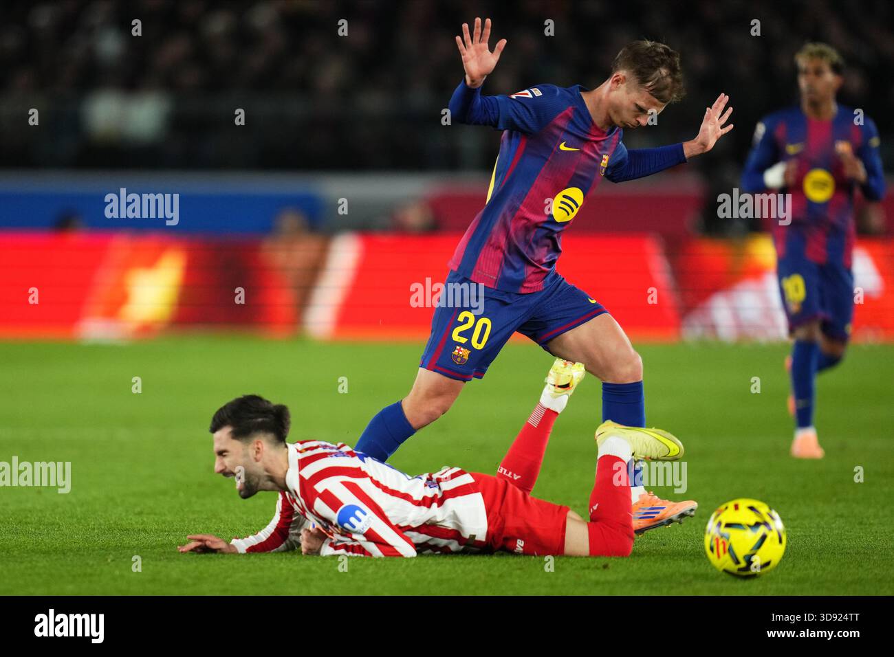 Barcelona, Spain. 03rd Dec, 2025. Alex Baena of Atletico de Madrid and Dani Olmo of FC Barcelona during the La Liga EA Sports match between FC Barcelona and Atletico de Madrid played at Spotify Camp Nou Stadium on December 2 2025 in Barcelona, Spain. (Photo by Bagu Blanco/PRESSIN) Credit: PRESSINPHOTO SPORTS AGENCY/Alamy Live News Stock Photo