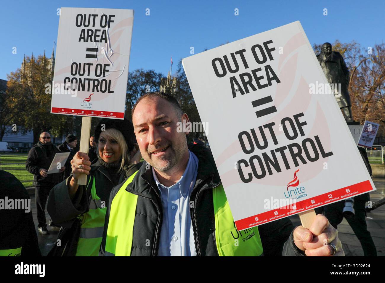 London, UK, 3rd November 2025. Two Unite Union members hold placards during a demonstration.Taxi and private hire drivers protested in Westminster, calling for action on the Casey report's call to end out-of-area licensing. The demonstration, organised by the Unite union, brought together drivers from across the UK who are concerned about regulations, safety, and driver incomes. The key issue is licence shopping—current laws allow drivers to get licensed by any local authority, no matter where they intend to work. Credit:James Willoughby/ALAMY Live News Stock Photo