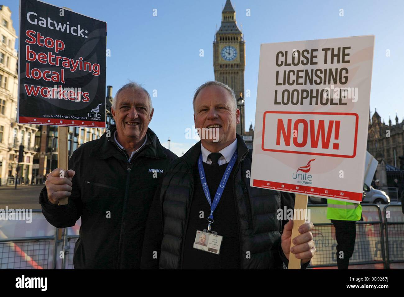London, UK, 3rd November 2025. Two Unite Union members hold placards during a demonstration.Taxi and private hire drivers protested in Westminster, calling for action on the Casey report's call to end out-of-area licensing. The demonstration, organised by the Unite union, brought together drivers from across the UK who are concerned about regulations, safety, and driver incomes. The key issue is licence shopping—current laws allow drivers to get licensed by any local authority, no matter where they intend to work. Credit:James Willoughby/ALAMY Live News Stock Photo