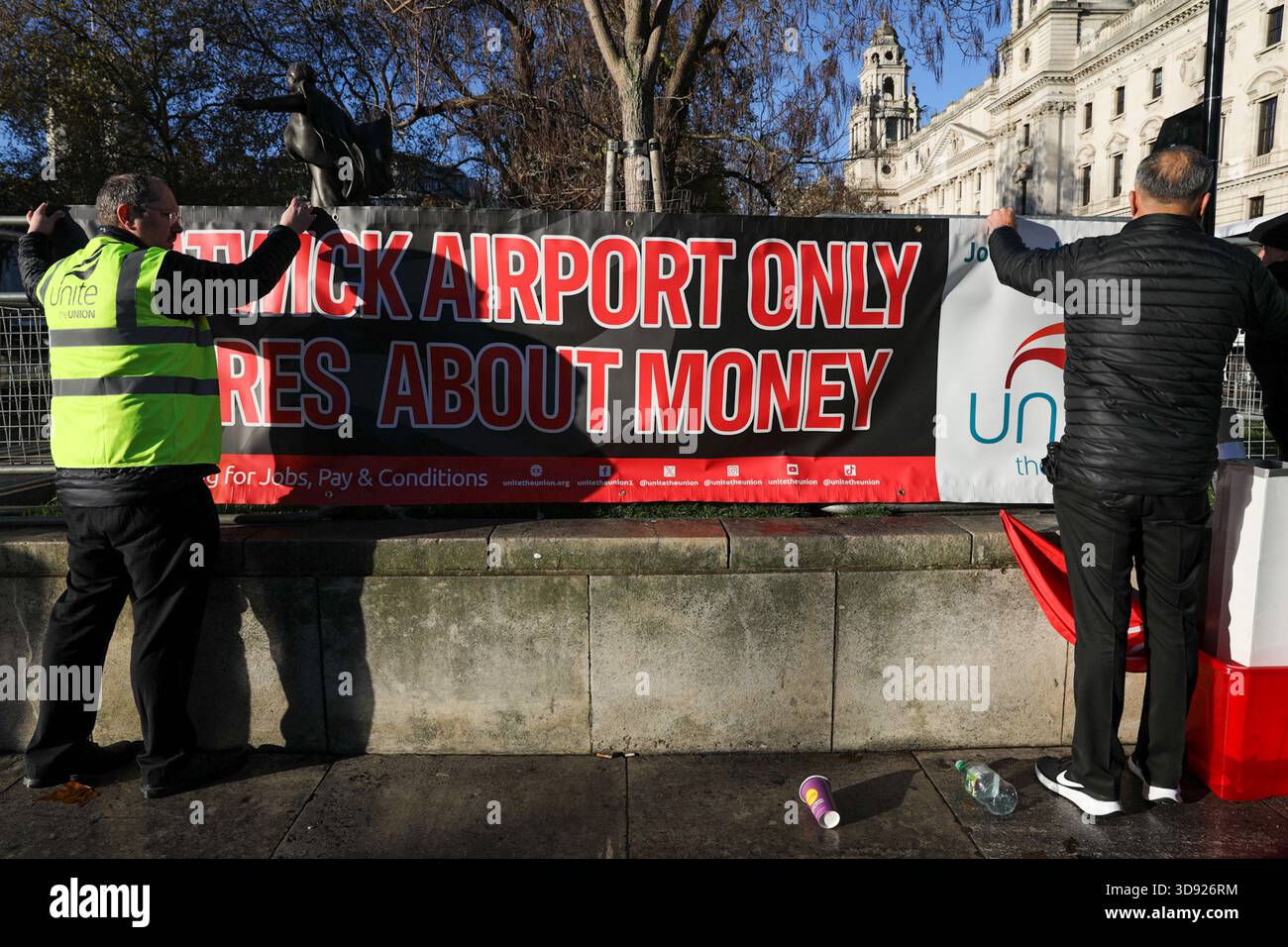 London, UK, 3rd November 2025. Unite Union members hang a banner during a demonstration.Taxi and private hire drivers protested in Westminster, calling for action on the Casey report's call to end out-of-area licensing. The demonstration, organised by the Unite union, brought together drivers from across the UK who are concerned about regulations, safety, and driver incomes. The key issue is licence shopping—current laws allow drivers to get licensed by any local authority, no matter where they intend to work. Credit:James Willoughby/ALAMY Live News Stock Photo