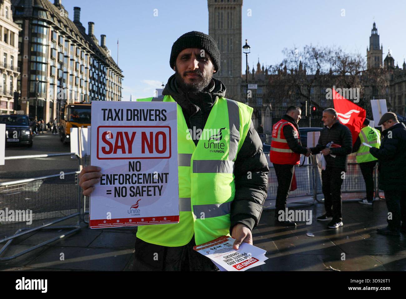 London, UK, 3rd November 2025. A Unite Union member holds a placard during a demonstration.Taxi and private hire drivers protested in Westminster, calling for action on the Casey report's call to end out-of-area licensing. The demonstration, organised by the Unite union, brought together drivers from across the UK who are concerned about regulations, safety, and driver incomes. The key issue is licence shopping—current laws allow drivers to get licensed by any local authority, no matter where they intend to work. Credit:James Willoughby/ALAMY Live News Stock Photo