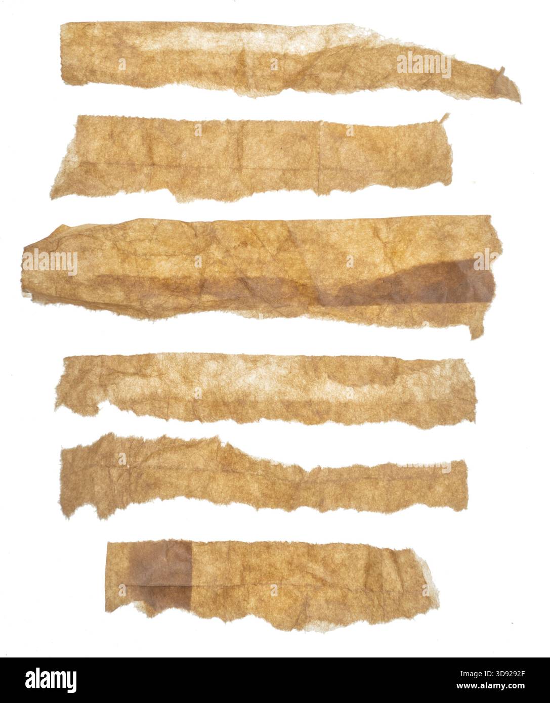 Wrinkled paper strips with torn edges on white background Stock Photo