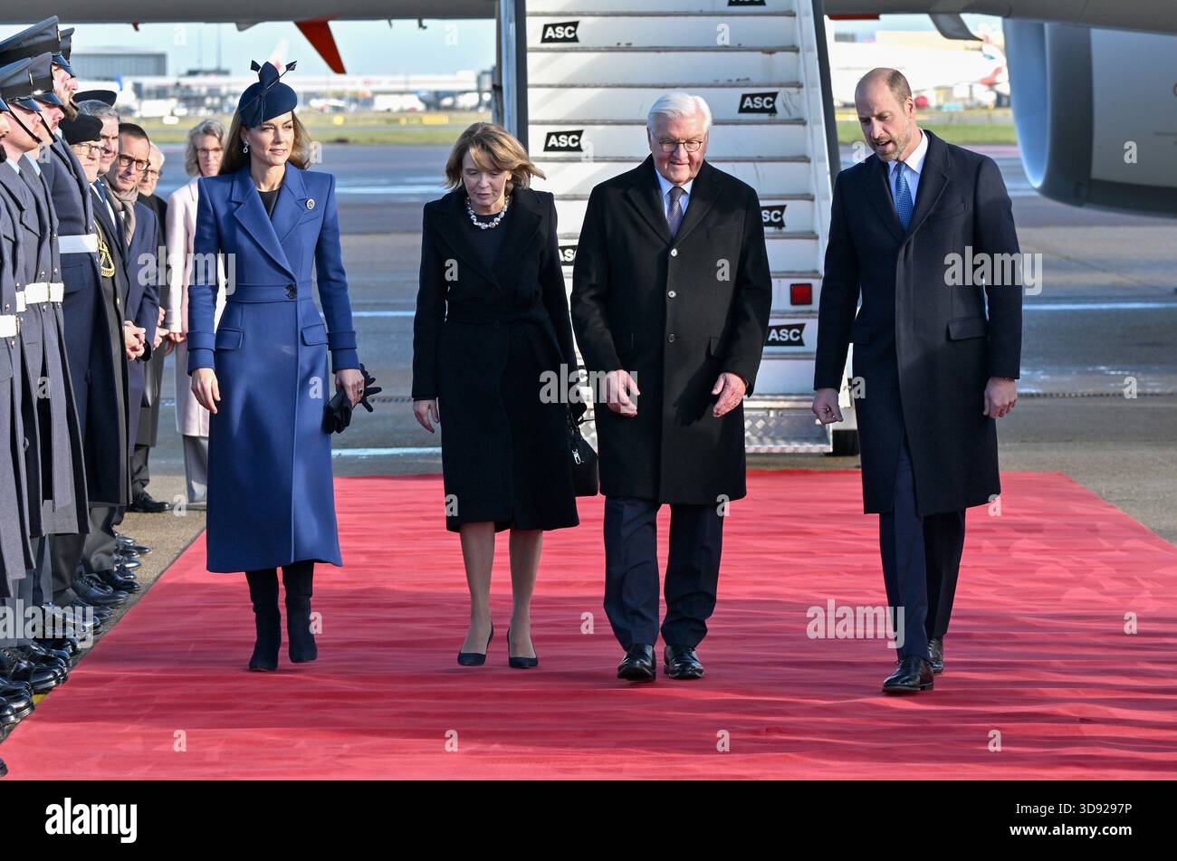 The Prince and Princess of Wales walk with German President Frank-Walter Steinmeier (centre right) and his wife Elke Budenbender (centre left) as they arrive at London Heathrow Airport, on day one of the state visit to the UK by the President of the Federal Republic of Germany. Picture date: Wednesday December 3, 2025. Stock Photo