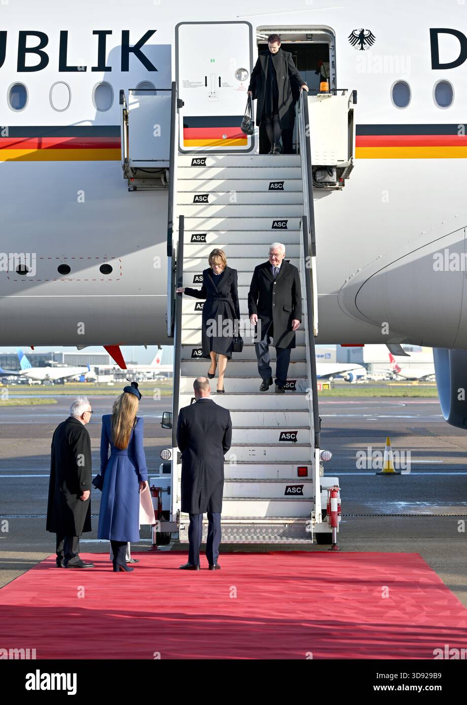 The Prince and Princess of Wales wait at the bottom of the steps to greet greet German President Frank-Walter Steinmeier and his wife Elke Budenbender as they arrive at London Heathrow Airport, on day one of the state visit to the UK by the President of the Federal Republic of Germany. Picture date: Wednesday December 3, 2025. Stock Photo
