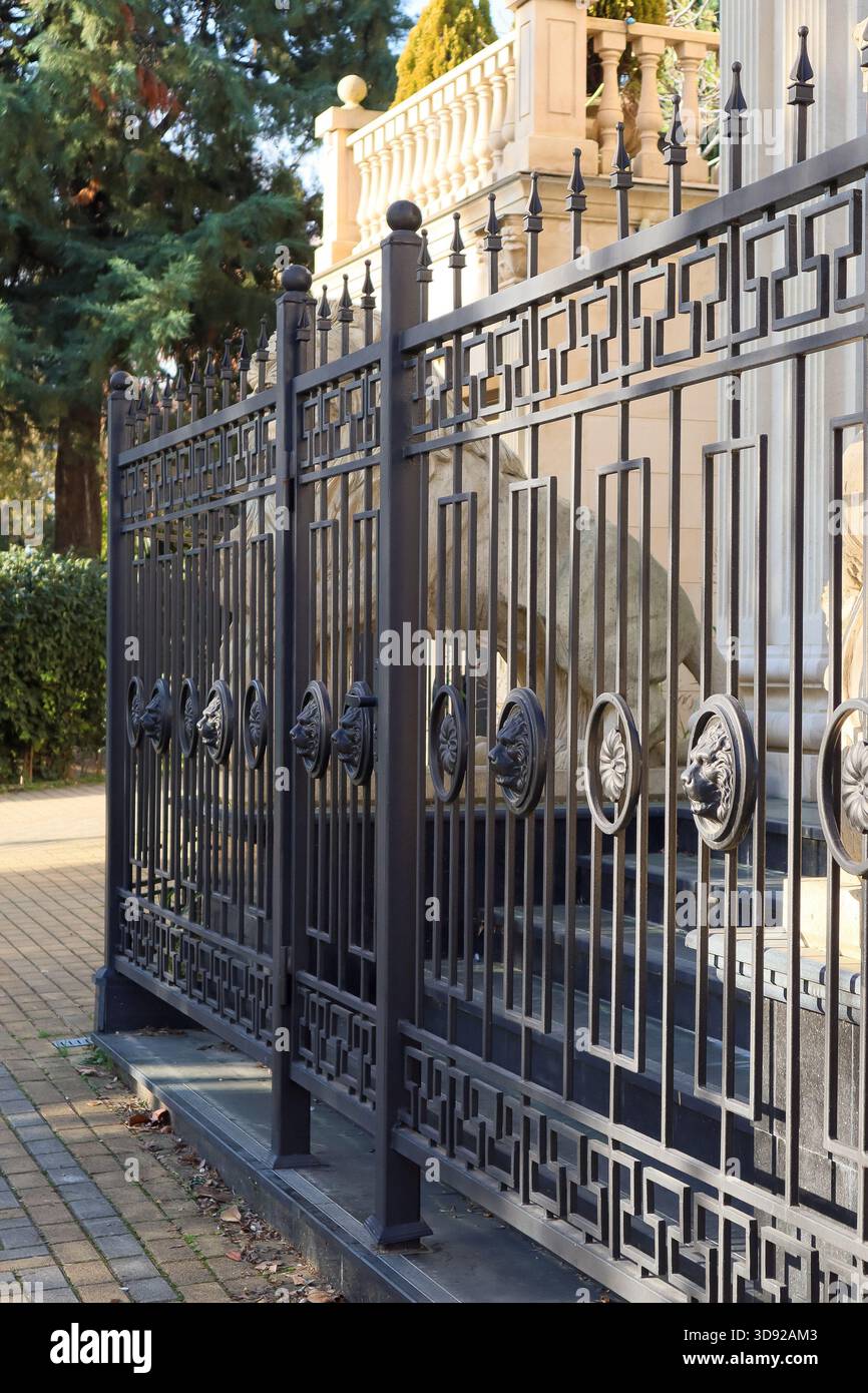 Wrought iron fence designs hi-res stock photography and images - Alamy, image size:866x1390