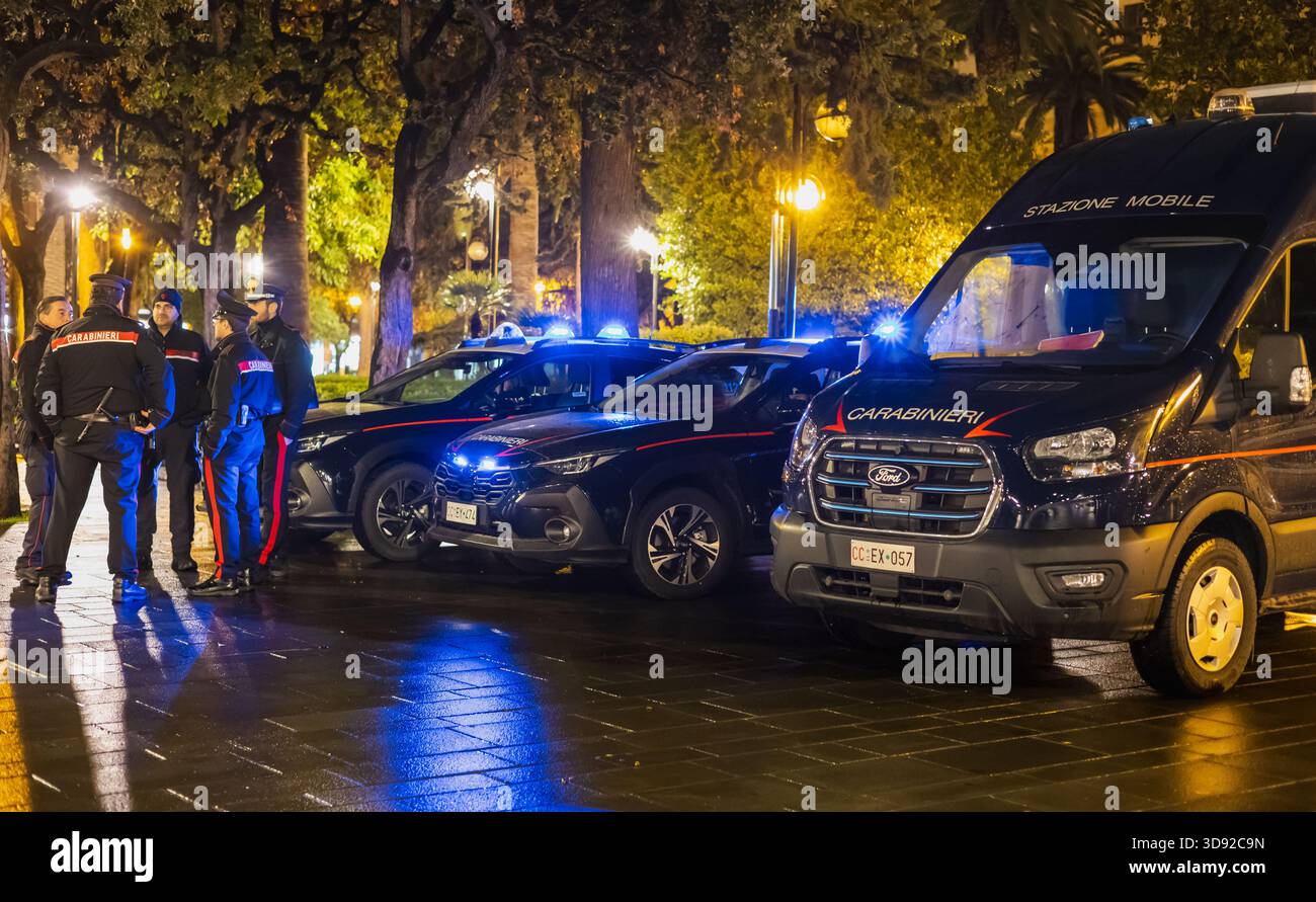italian carabinieri police officers standing next to their official ...
