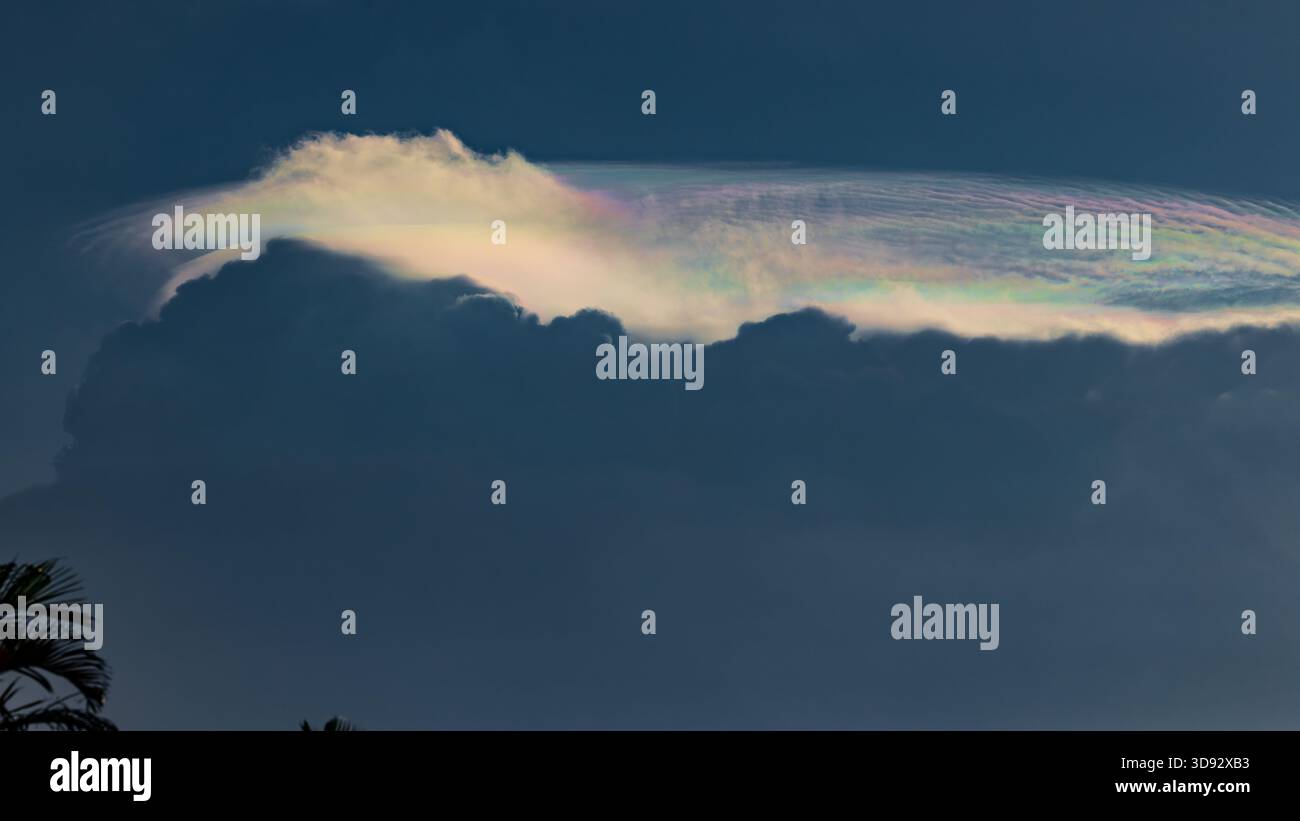 Iridescent cloud formations late afternoon Stock Photo