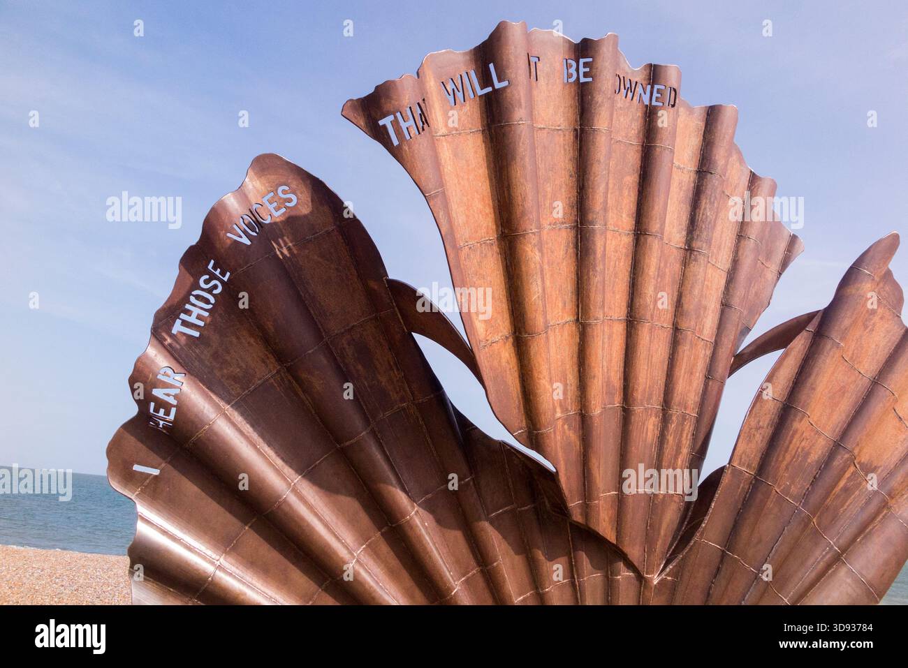 Sculpture 'Scallop' is a 2003 work by British artist Maggi Hambling. It is located on Aldeburgh beach, Suffolk, UK, in an Area of Outstanding Natural Beauty. Quotation words are taken from Peter Grimes by Sir Benjamin Brittain. (140) Stock Photo