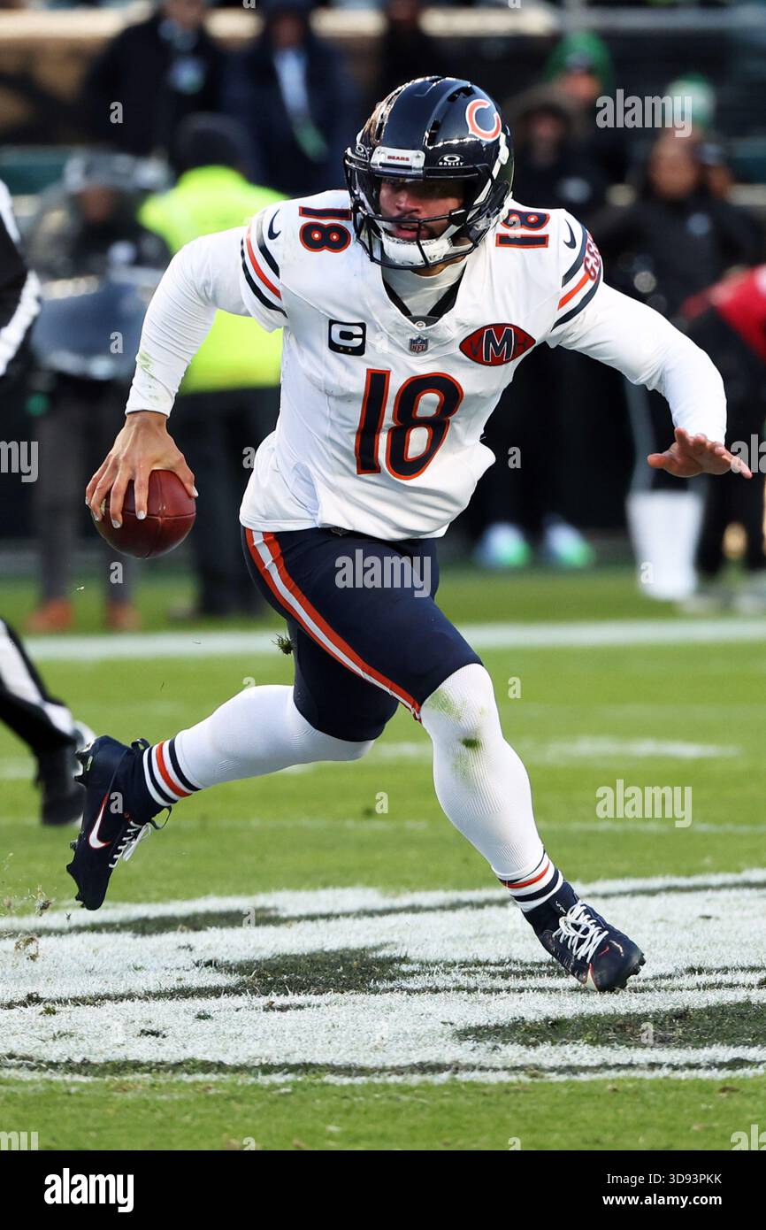 Chicago Bears quarterback Caleb Williams (18) runs with the ball during ...