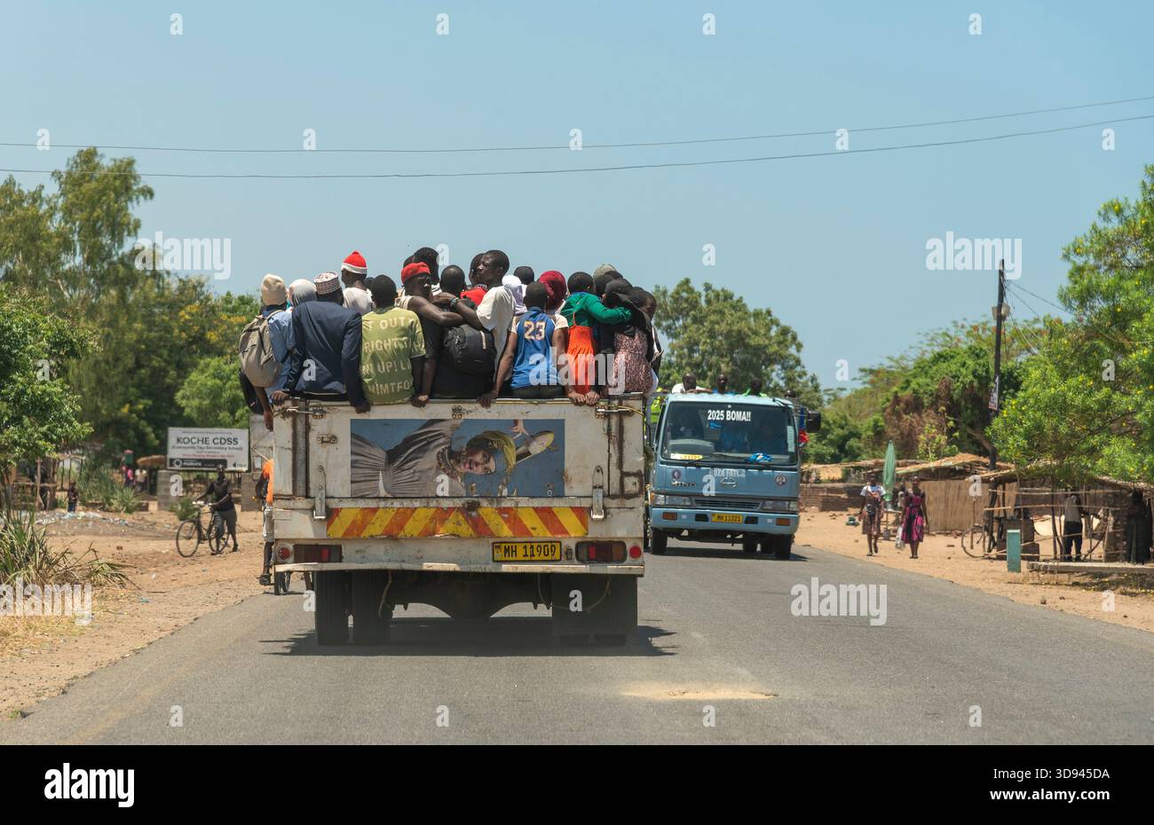 Mangochi southern Malawi Africa. 16.11.2025.  Malawian people taking a ride on an open truck in southern Malawi Africa. - Stock Image