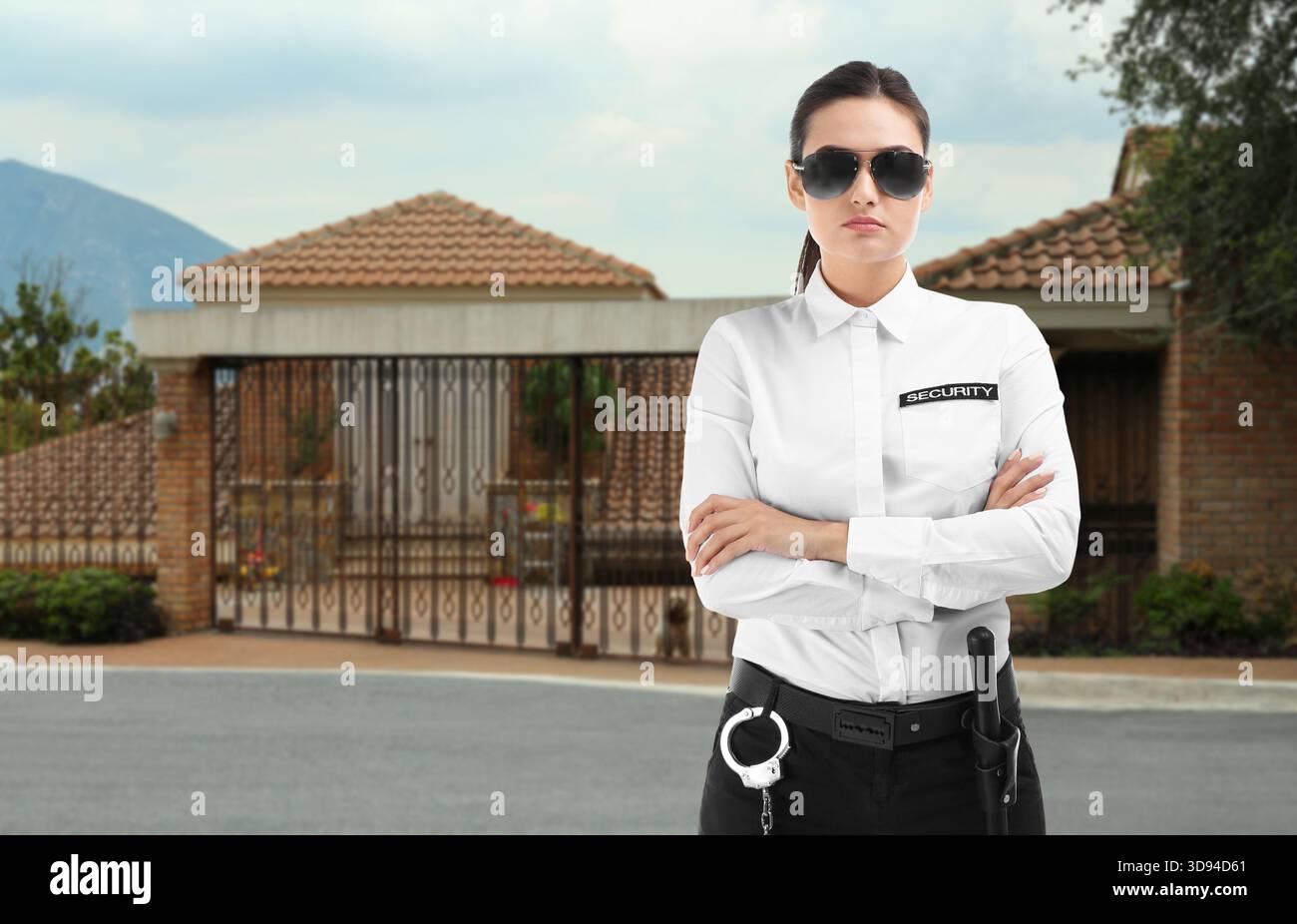 Security guard near house outdoors. Private property protection Stock ...