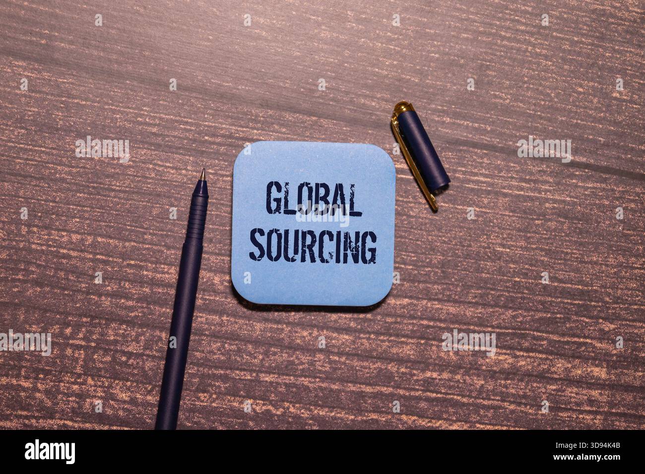 Global sourcing is shown using a text. Stock Photo
