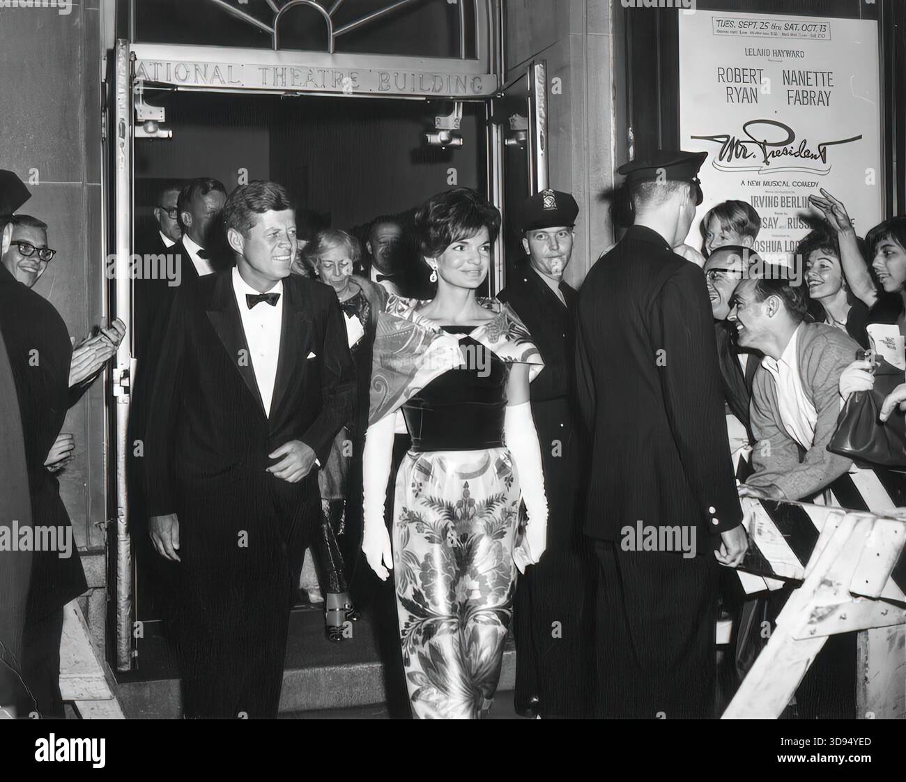JFK and Jacqueline Kennedy Leave Benefit Premiere of Mr. President at National Theatre, Washington DC Stock Photo